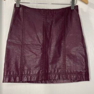 Free People Vegan Purple Leather Mini Skirt with brass zipper on back. Size 4